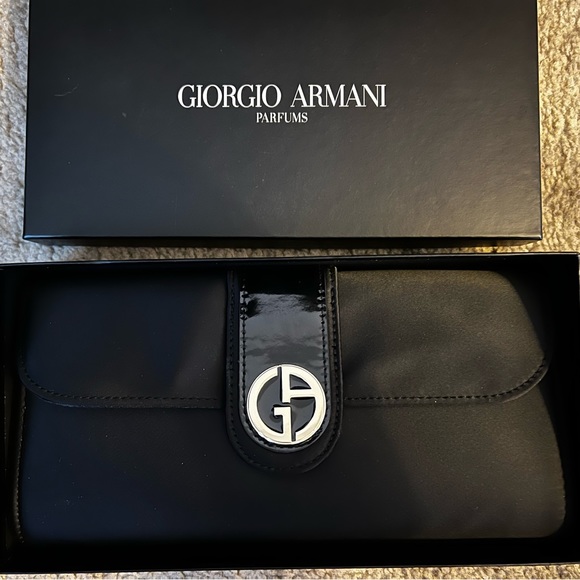 Giorgio Armani Parfums black satin clutch bag
New with tags - Picture 5 of 5